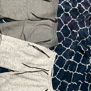 Bundle of 2 shorts one grey short and a white with black strip short